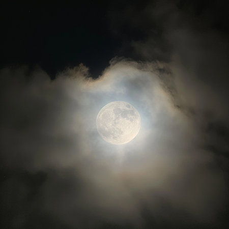 The full moon in the night sky in clouds. 3D illustrationの素材