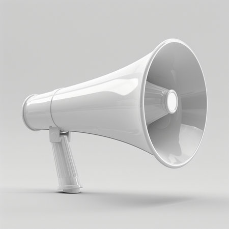 A modern, sleek white megaphone isolated on a seamless light gray studio backdrop, casting subtle shadows, perfect for conceptual use.の素材