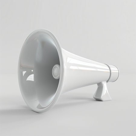 A realistic 3D render of a bright white megaphone lying on a clean, seamless white background.の素材