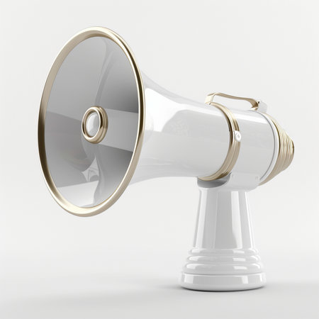 A sleek, white megaphone featuring elegant gold trim and handle, isolated on a seamless white backdrop. Professional studio shot.の素材