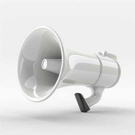 A sleek, modern white plastic megaphone with a textured speaker grill, isolated on a seamless white backdrop.の素材