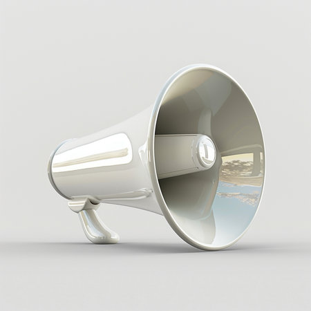 A clean, glossy white megaphone with a modern design, casting a subtle shadow on a plain gray surface. Studio shot.の素材