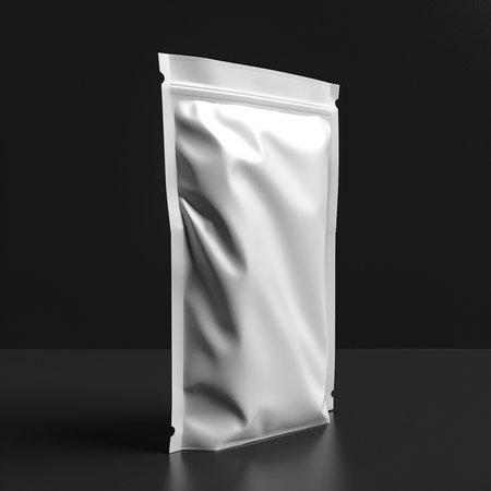 Blank white package for coffee or tea on black background. 3d renderingの素材