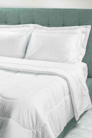 modern bedroom with pillows on bed, interior design concept decorationの写真素材