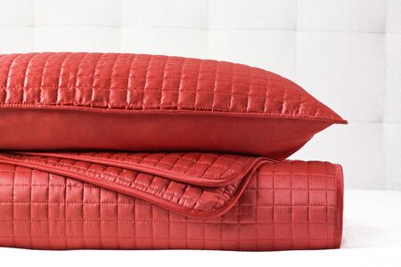 Cushions in bed background with copy space. Sweet home and cozy concept. Close upの写真素材