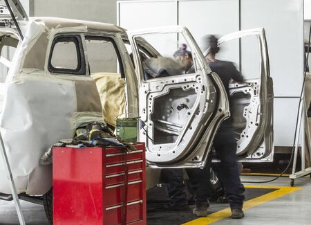 Repair and painting center of vehicles, work area for cars, mechanical center for transportの写真素材