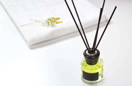 spa massage setting, lavender product, oil on wooden backgroundの写真素材