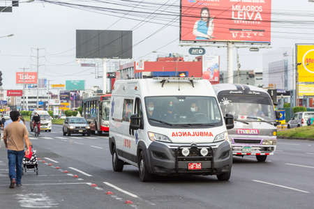 Lima, Peru - April 8 2020: Ambulance in the city looking for virus sick in South America. COVID-19 pandemic times.のeditorial素材