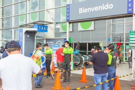 Lima, Peru - April 8 2020: Epidemic coronavirus. temperature control before entering the supermarket in Tottus. Safety procedures.のeditorial素材