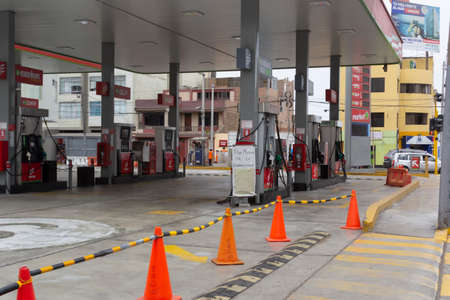 Lima, Peru - April 8, 2020: Service station closed until further notice by covid coronavirus outbreak in south America.のeditorial素材
