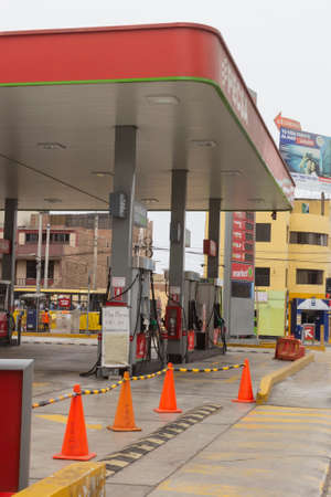 Lima, Peru - April 8, 2020: Service station closed until further notice by covid coronavirus outbreak in south America.のeditorial素材