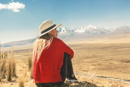 Beautiful woman enjoying the mountainous landscapes of the Callejon de Huaylas, Huraz. Peru.の写真素材