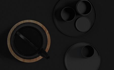 Modern black cast iron teapot with levitating cups, art set for tea time. 3d rendering.の写真素材