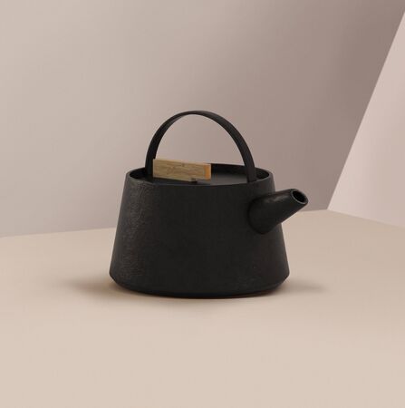 Modern black cast iron teapot with colorful minimalist background, art set for tea time. 3d rendering.の写真素材