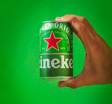 Lima, Peru - August 10 2020: Heineken beer can green background. Heineken beer is the flagship product of Heineken International.のeditorial素材