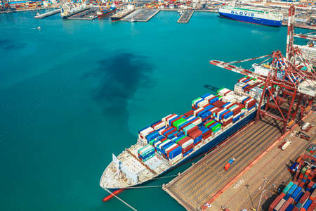 Aerial view container ship carrying container in import export business logistic and transportation of international by container ship in the open sea, with copy space.のeditorial素材