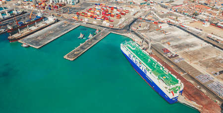 Aerial view container ship carrying container in import export business logistic and transportation of international by container ship in the open sea, with copy space.のeditorial素材