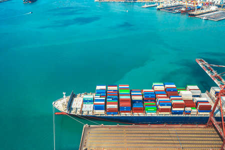 Aerial view container ship carrying container in import export business logistic and transportation of international by container ship in the open sea, with copy space.のeditorial素材
