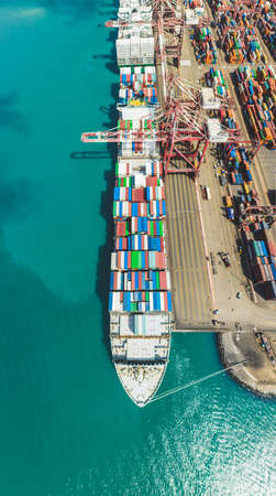 Aerial view container ship carrying container in import export business logistic and transportation of international by container ship in the open sea, with copy space.のeditorial素材