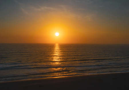 Sunset water horizon landscape. Sunset water scene. Beach sunset horizon view. Sunset water landscape.の写真素材