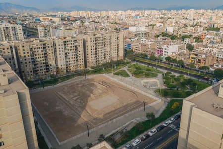 Lima, Peru - February 05, 2021: Aerial view of Huaca archeological site in San Miguel disctrict. Ancient pre-inca ruins in the middle of an urban city.のeditorial素材