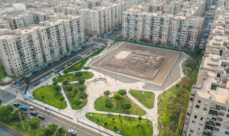 Lima, Peru - February 05, 2021: Aerial view of Huaca archeological site in San Miguel disctrict. Ancient pre-inca ruins in the middle of an urban city.のeditorial素材