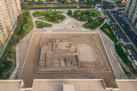 Lima, Peru - February 05, 2021: Aerial view of Huaca archeological site in San Miguel disctrict. Ancient pre-inca ruins in the middle of an urban city.のeditorial素材