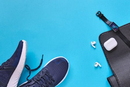 Concept healthy lifestyle outfit, sport and diet. Top view, text space. Athlete's set. Flat lay composition. Sports unisex, male and female fitness.の写真素材