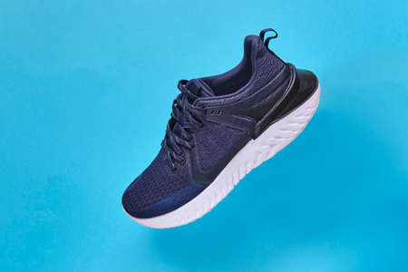 Shoes running Concept healthy lifestyle outfit, sport and diet. Top view, text space. Athlete's set. Flat lay composition, male and female fitness.の写真素材