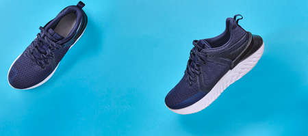 Shoes running Concept healthy lifestyle outfit, sport and diet. Top view, text space. Athlete's set. Flat lay composition, male and female fitness.の写真素材