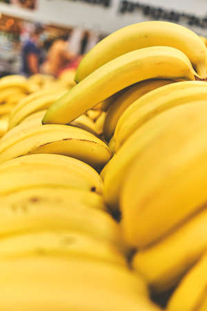 Banana in Grocery Store. Concept of healthy food, bio, vegetarian, diet. Selective focus.の写真素材