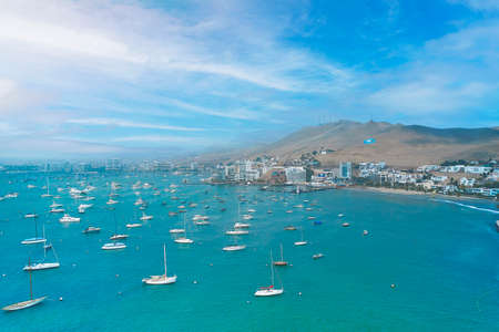 Aerial view of the bay, marina and buildings of Ancon - Lima, Peru; Summer area, The beach and some exterior buildings in Ancon.の写真素材