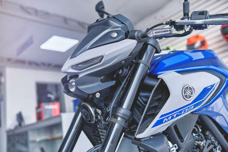 Lima, Peru - May 15, 2021: Yamaha motorcycle shop, Yamaha MT03 abs, Motorcycles in the showroom Yamaha shop. Store motorcycle, professional tools, selective focus.のeditorial素材