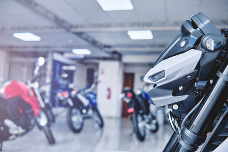 Lima, Peru - May 15, 2021: Yamaha motorcycle shop, Yamaha MT03 abs, Motorcycles in the showroom Yamaha shop. Store motorcycle, professional tools, selective focus.のeditorial素材