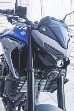 Lima, Peru - May 15, 2021: Yamaha motorcycle shop, Yamaha MT03 abs, Motorcycles in the showroom Yamaha shop. Store motorcycle, professional tools, selective focus.のeditorial素材