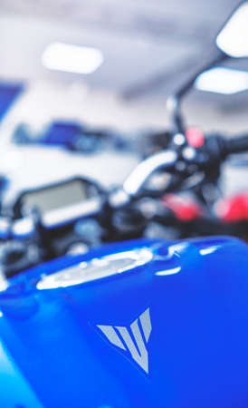 Lima, Peru - May 15, 2021: Yamaha motorcycle shop, Yamaha MT03 abs, Motorcycles in the showroom Yamaha shop. Store motorcycle, professional tools, selective focus.のeditorial素材