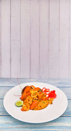 Peruvian food, "arroz con marino": A sea food selection served with rice. , top view. Selective Focusの写真素材