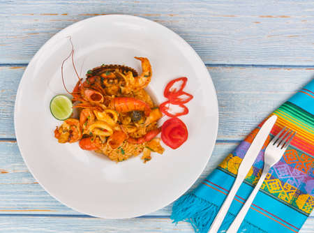 Peruvian food, "arroz con marino": A sea food selection served with rice. , top view. Selective Focusの写真素材