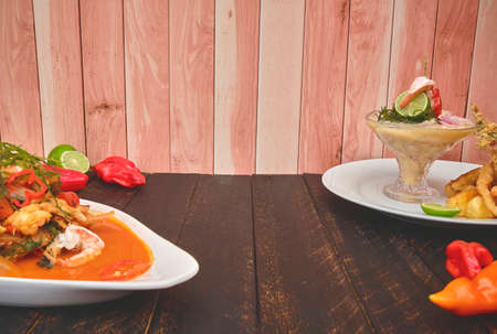 Peruvian food: called Leche de tigre and sudado de seafood, seafood (fish sweat, scallops, shrimp,...