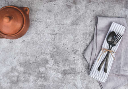 Decorated cutlery, fork and knife on a blue napkin, mockup. Selective focusの写真素材