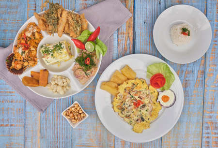 Peruvian food, Food fountain "Ronda marina" and "seafood tortilla" A varied seafood, Classic Ceviche + rice with Seafood + fried fish + potato tuna cause, Selective focusの写真素材