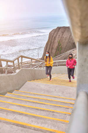 Runner athlete running up stairs, Sport lifestyle concept