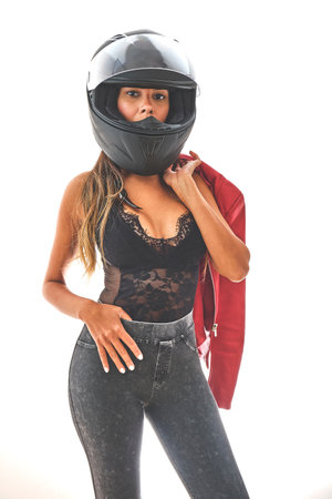 Sexuality empowered motorcyclist woman with modern look, Power woman concept.の写真素材