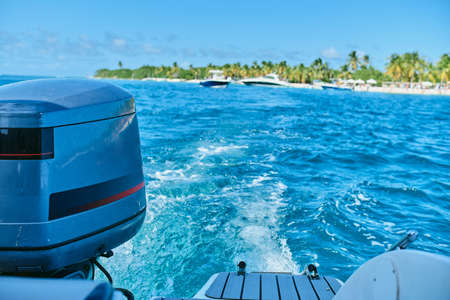 Foam trail, wake of boats, in the sea water. Departing from a Caribbean paradise island. Boat...