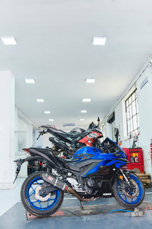 Lima, Peru - May 2022: Motorbike is repaired and selling in Motoparttoto Yamaha shop, common shop in lima, Yamaha Motorcycle repair service area.のeditorial素材