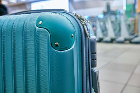 Suitcase or baggage with airport luggage trolley in the international airport, focus on suitcases. Vacation conceptの写真素材