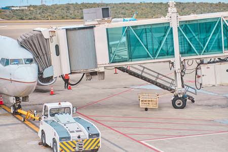 Jetway waiting for a plane to arrive on airport.airport terminal boarding gate. Travel Concept.の写真素材