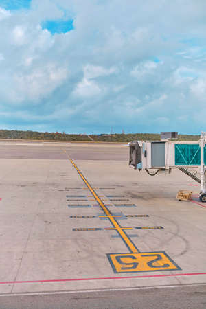 Jetway waiting for a plane to arrive on airport.airport terminal boarding gate. Travel Concept.の写真素材