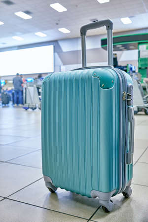 Suitcase or baggage with airport luggage trolley in the international airport, focus on suitcases. Vacation conceptの写真素材