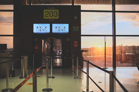 Panama City, Panama: Boarding gate entrance with information board in airpot Panama City, Panama.のeditorial素材